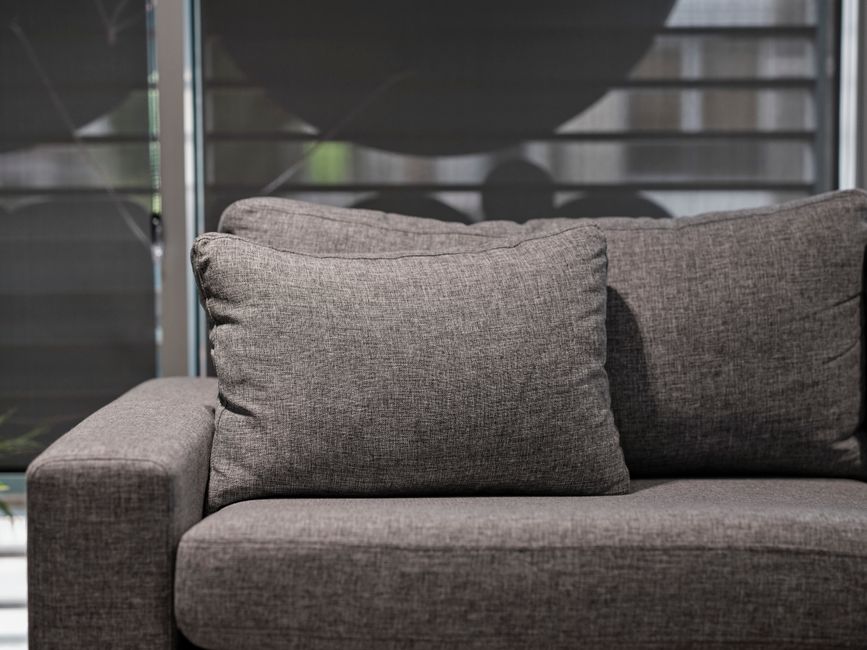 Expert upholstery cleaning on a fabric sofa